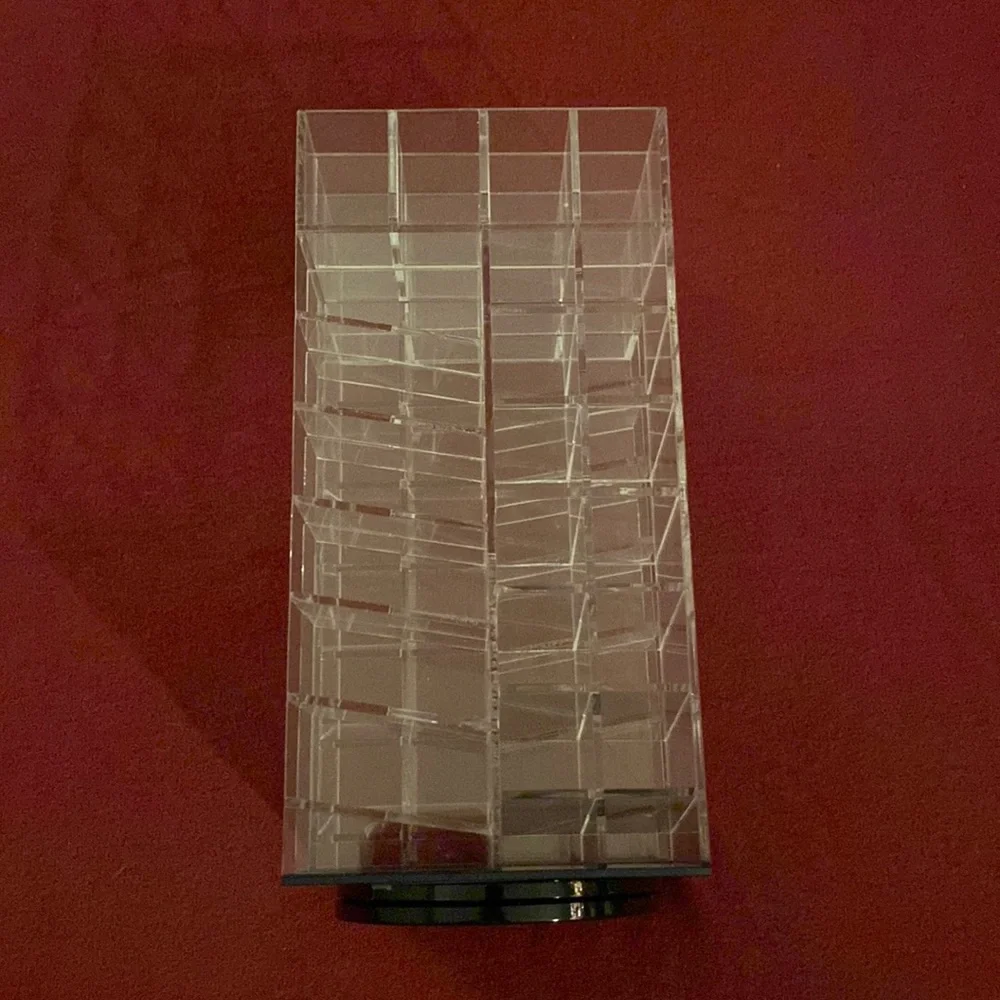 Acrylic spinning lipstick tower